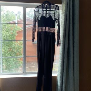 Express black lace jumpsuit size 6 very slightly tapered leg